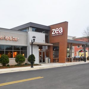 Restaurant with plank siding with road in front