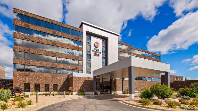 Best Western hotel with silver metal cladding, glazing and brick